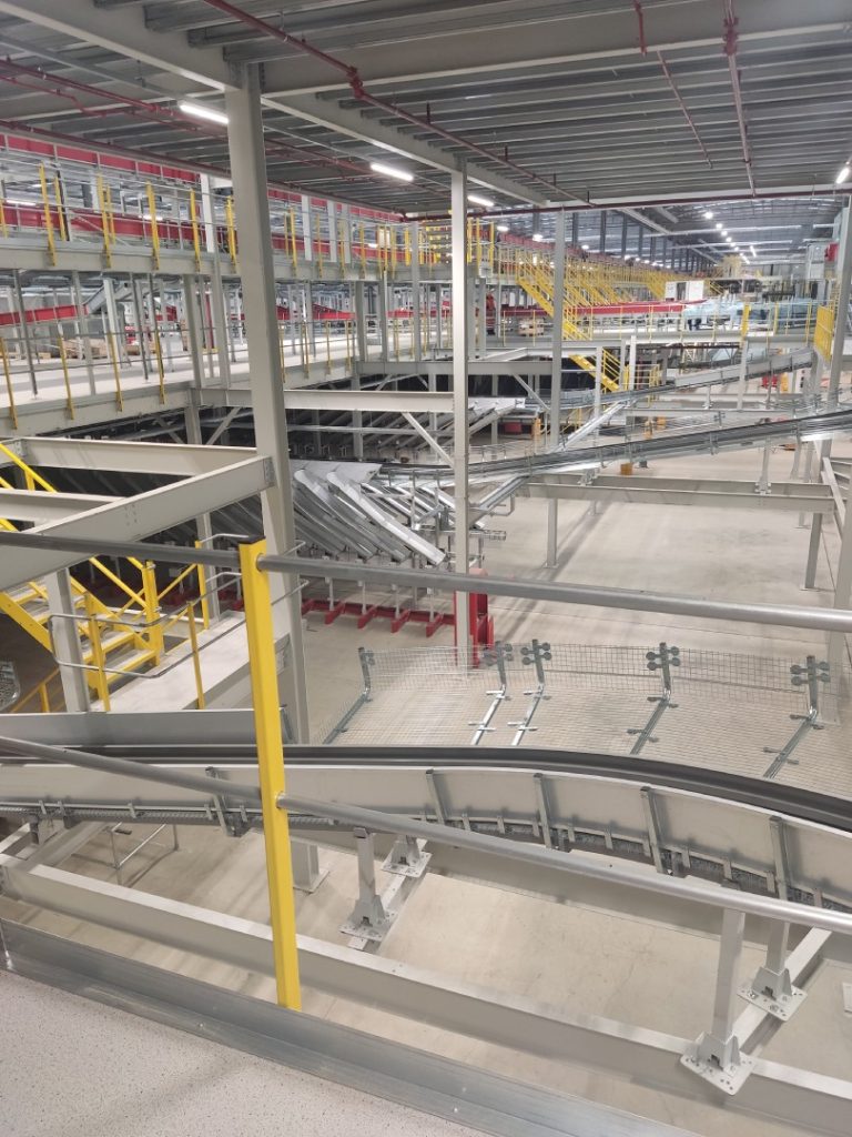 High-speed automated sorting lines in distribution centre by Exceltra Engineering
